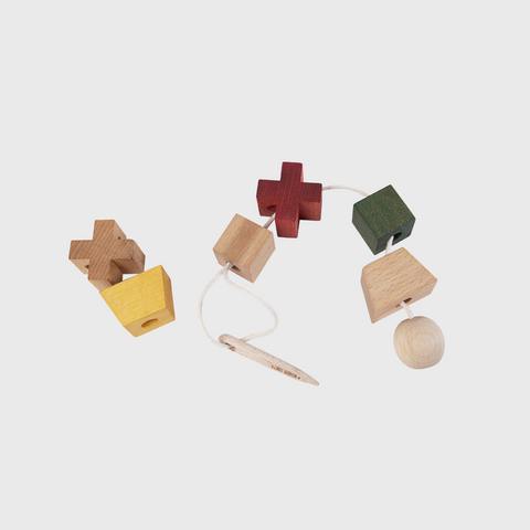 Wooden needle for sewing
